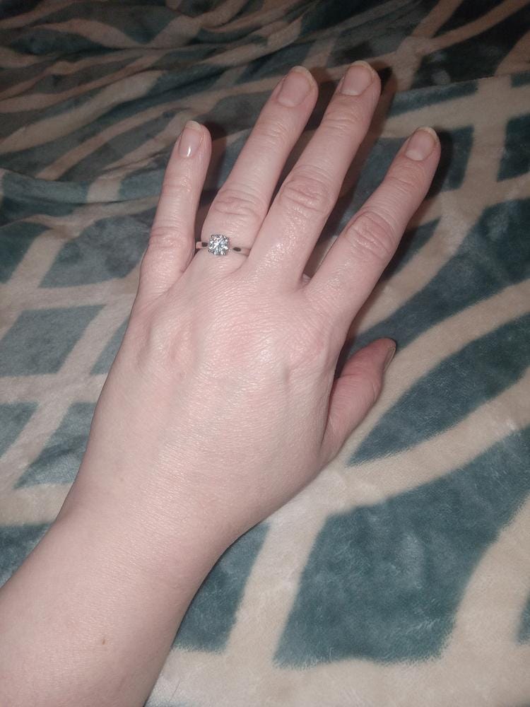 Customer photo review of Moissanite by Cate & Chloe Abigail 1.0tcw Round Cut 925 Sterling Silver 18k White Gold Plated Engagement Ring