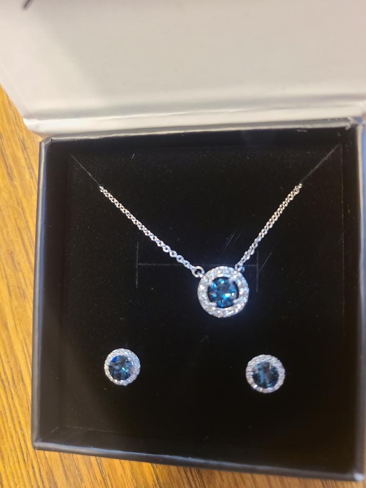 Customer photo review of Royal Birthstone 18k White Gold Plated Halo Stud Earrings with Round Cut Swarovski Crystals