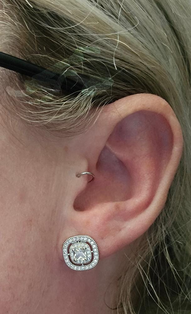Customer photo review of Noelle 18k White Gold Plated Halo Stud Earrings with Simulated Diamond Crystals