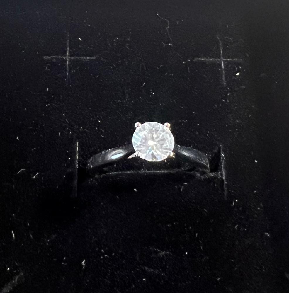 Customer photo review of Moissanite by Cate & Chloe Abigail 1.0tcw Round Cut 925 Sterling Silver 18k White Gold Plated Engagement Ring
