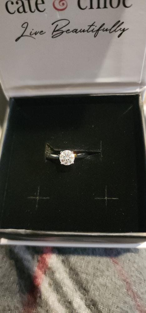 Customer photo review of Moissanite by Cate & Chloe Abigail 1.0tcw Round Cut 925 Sterling Silver 18k White Gold Plated Engagement Ring