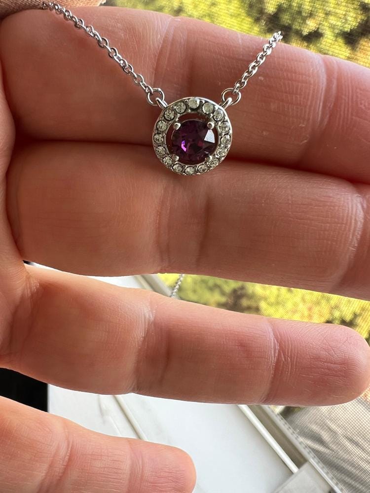 Customer photo review of Royal Birthstone 18k White Gold Plated Halo Stud Earrings with Round Cut Swarovski Crystals