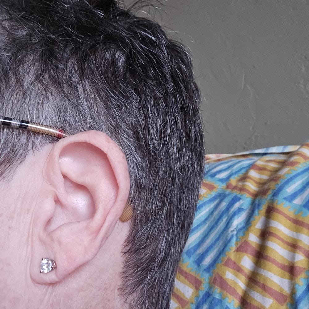 Customer photo review of Aria 18k White Gold Plated Silver Drop Earrings with Simulated Diamond Crystals — Final Sale