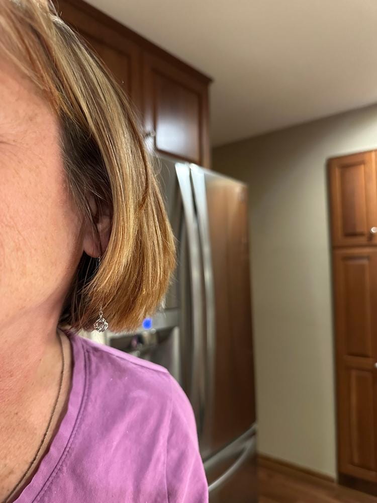 Customer photo review of Lena 18k White Gold Dangle Earrings with Swarovski Crystals