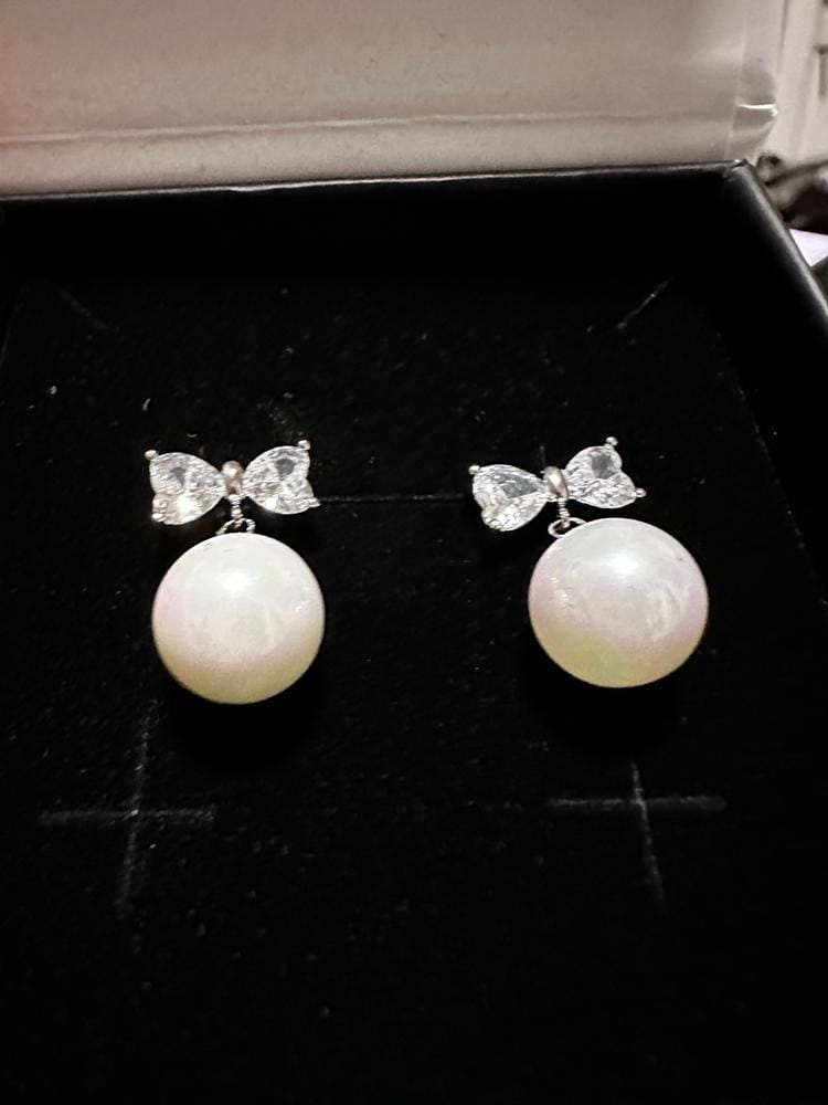 Customer photo review of Oakley 18k White Gold Plated Silver Drop Pearl Earrings with Swarovski Crystals