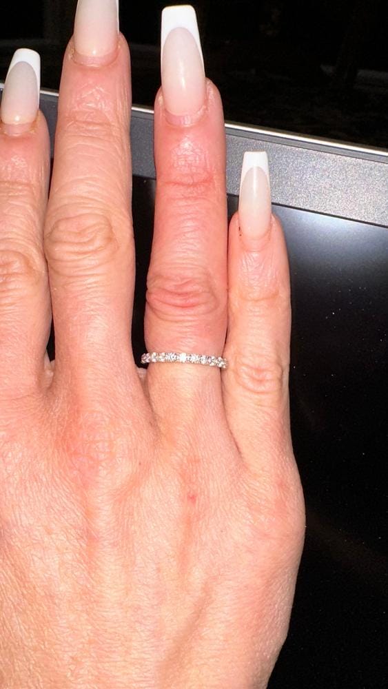 Customer photo review of Moissanite by Cate & Chloe Sadie 0.9tcw Round Cut 925 Sterling Silver 18k White Gold Plated Wedding Band