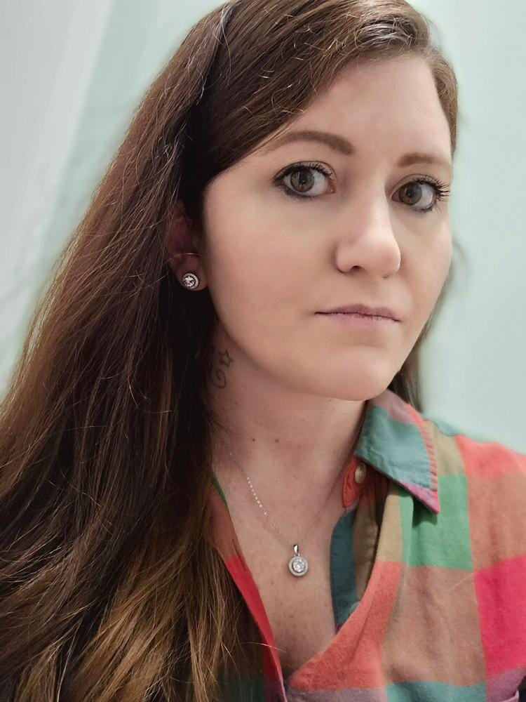 Customer photo review of Ariel 18k White Gold Plated Halo Stud Earrings with Simulated Diamond Crystals