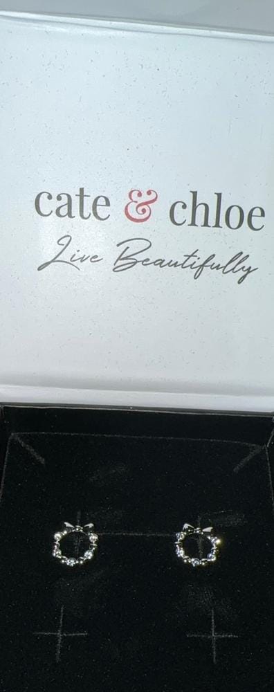 Customer photo review of Edith 18k White Gold Plated Silver Ribbon Stud Earrings with Swarovski Crystals