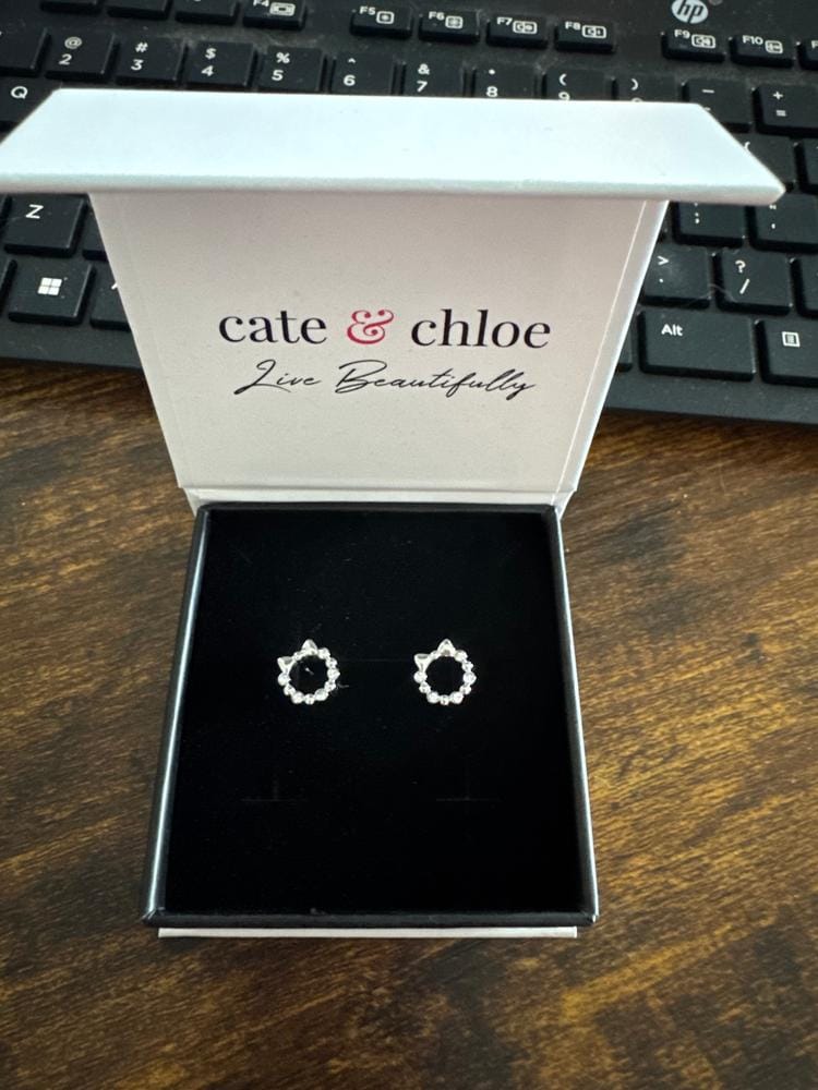 Customer photo review of Edith 18k White Gold Plated Silver Ribbon Stud Earrings with Swarovski Crystals