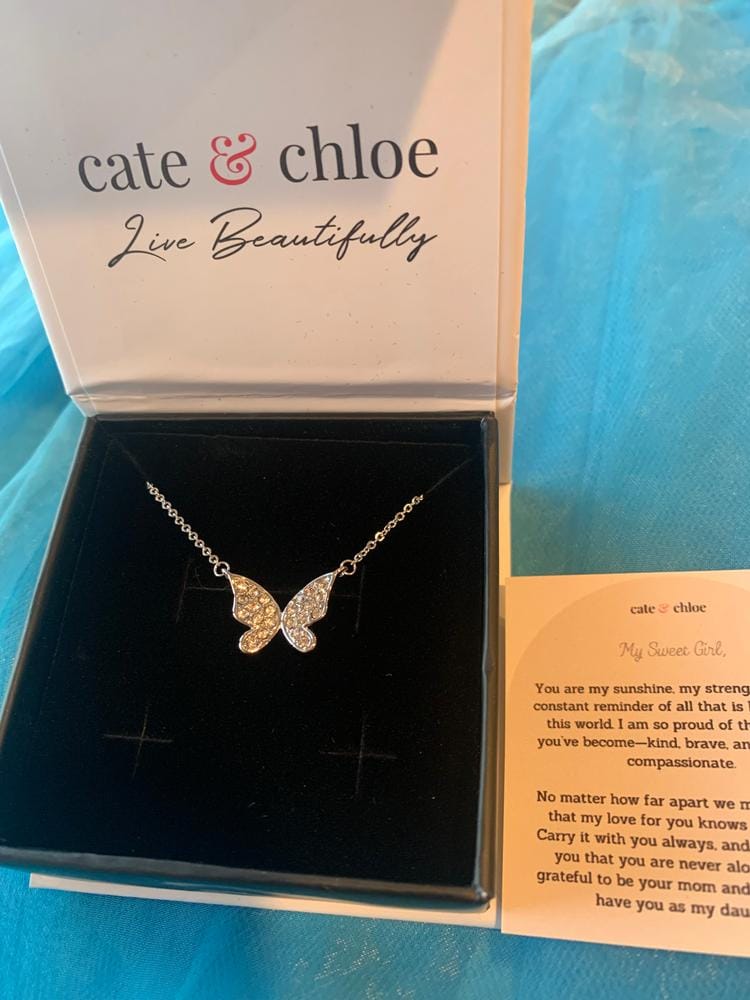 Customer photo review of Yuenen 18k White Gold Plated Butterfly Necklace with Swarovski Crystals & Heartfelt Message for Daughter