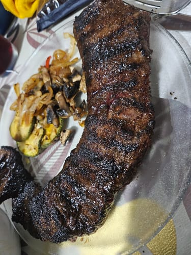 Reseña con foto de un cliente sobre Arrachera Outside Limpia