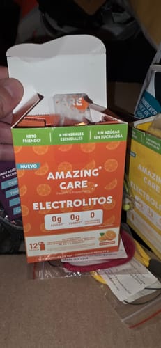 Customer photo review of Electrolitos Sabor Naranja - Bebida Hidratante en Polvo 12 sticks
