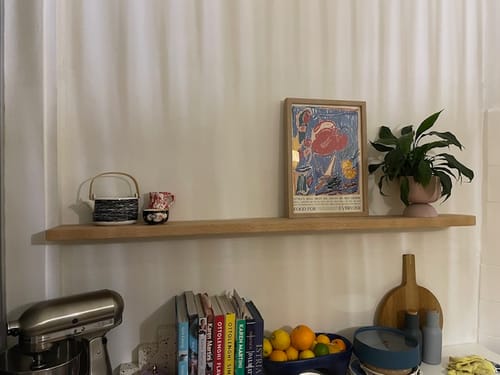 Customer photo review of Curved Floating Shelf
