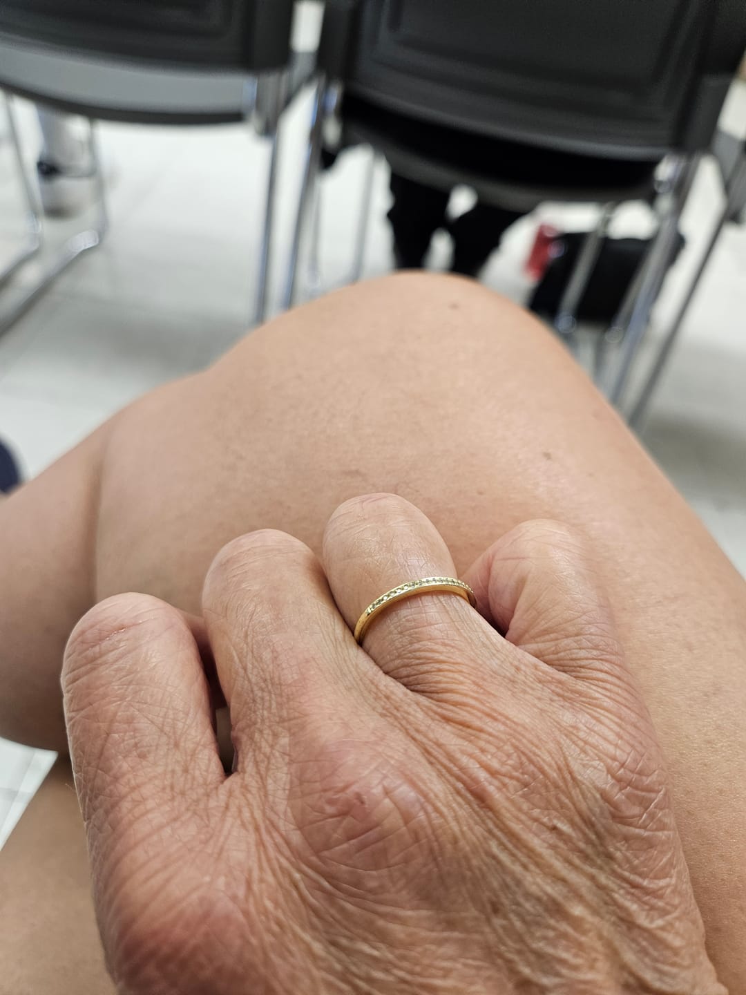 Customer photo review of Louily Yellow Gold Channel Set Curved Half Wedding Band