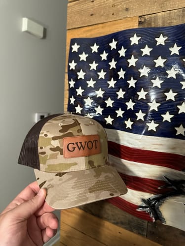 Customer photo review of Custom Leather Patch Trucker Hat - Yupoong 6606