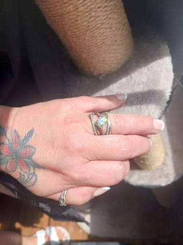 Customer photo review of Angel kiss Round Moissanite Sterling Silver Ring