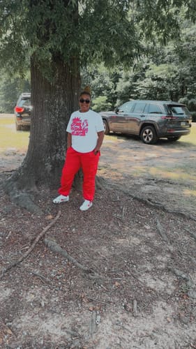 Customer photo review of Real Ones Move In Silence T-Shirt (Red Print)
