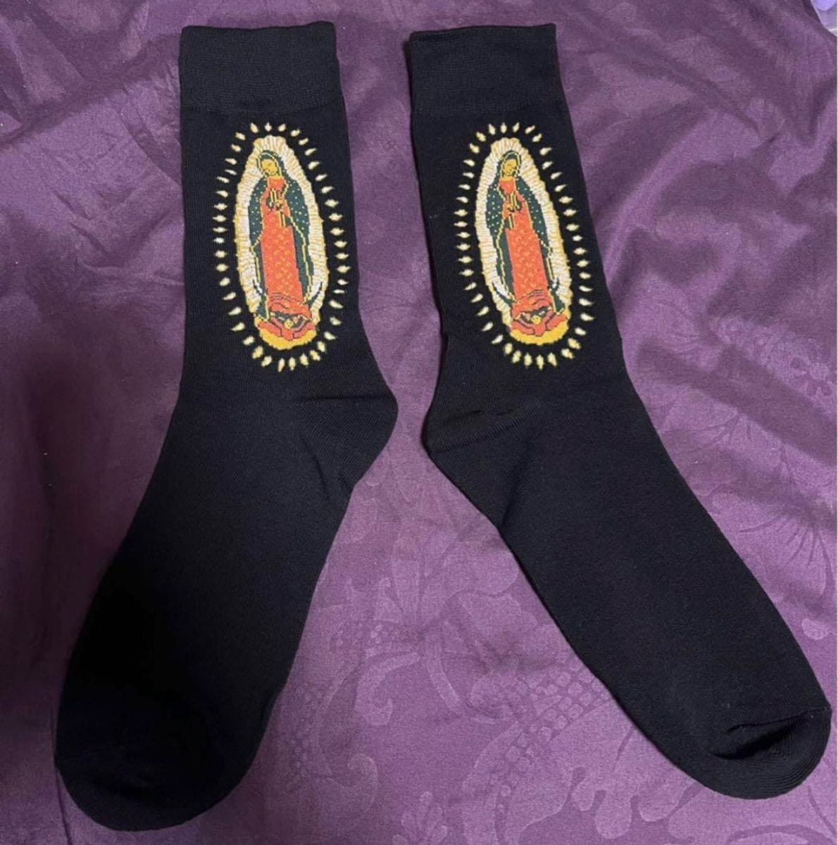 Customer photo review of Christianartworkshop Black Virgin of Guadalupe Religious Crew Socks: Retro Design, Exclusive Faith Flair