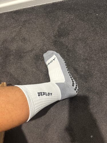 Customer photo review of Deploy V1 Grip Socks - White