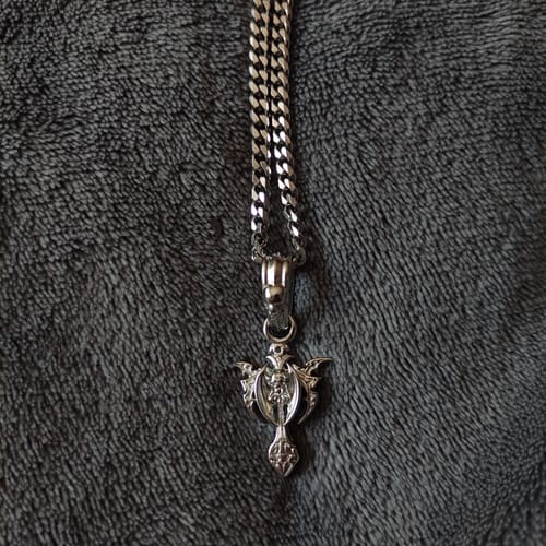 Customer photo review of TRIBAL CROSS PENDANT