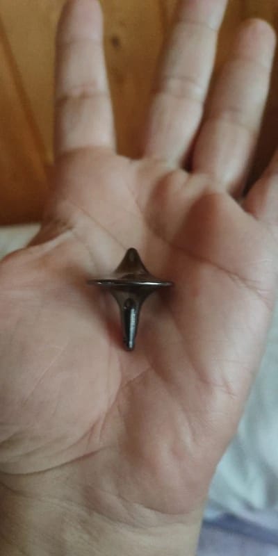 Customer photo review of Metal Gyro Spinning Top Totem Print — Silver | KIMLUD