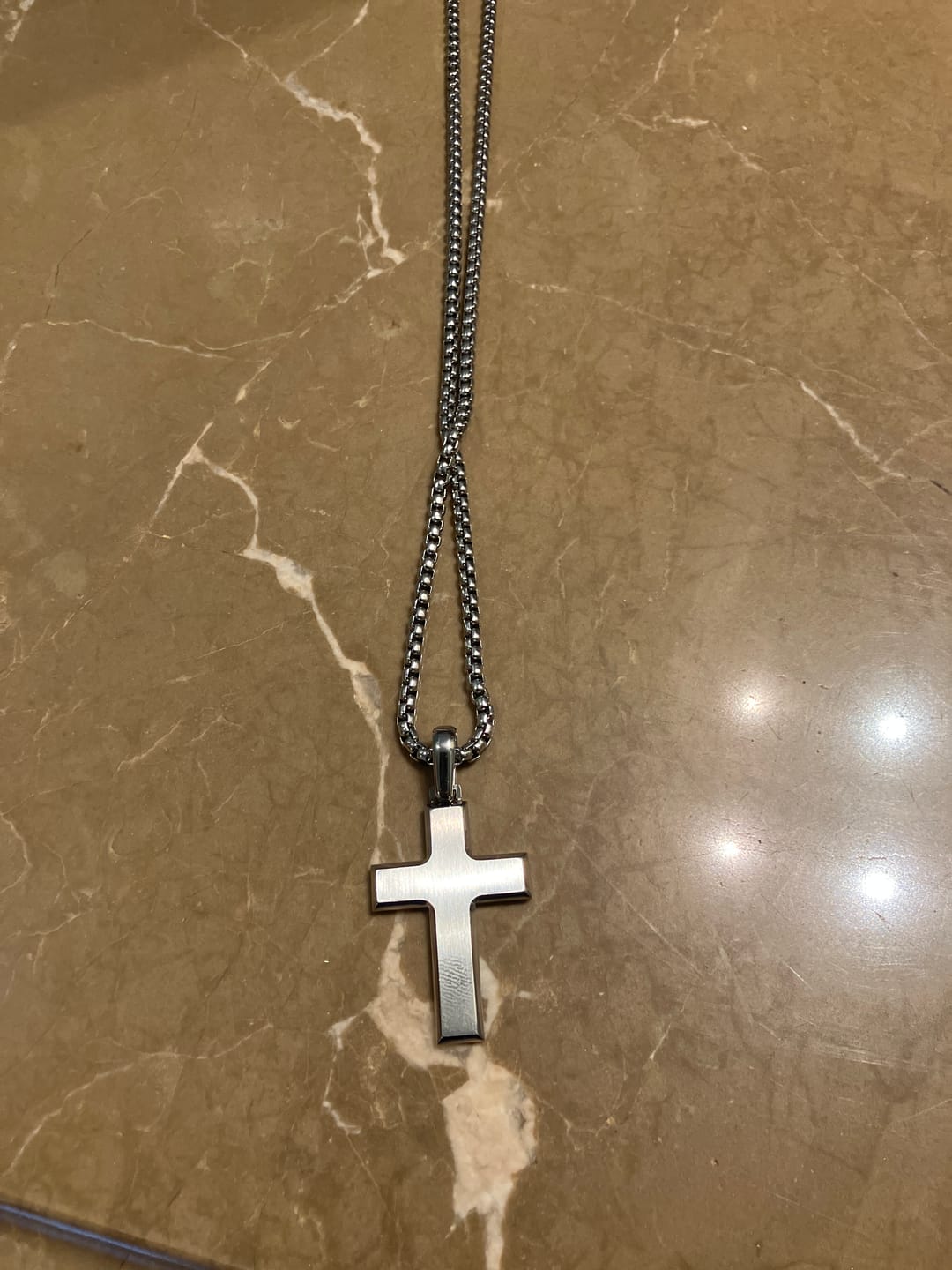 Customer photo review of Beveled Edge Cross Pendant