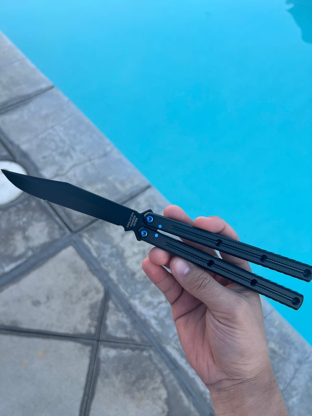 Customer photo review of Blue River Glossy Kraken 7075 Aluminum Handle Titanium Alloy Screws Balisong Stainless Steel Blade Clone Bushing