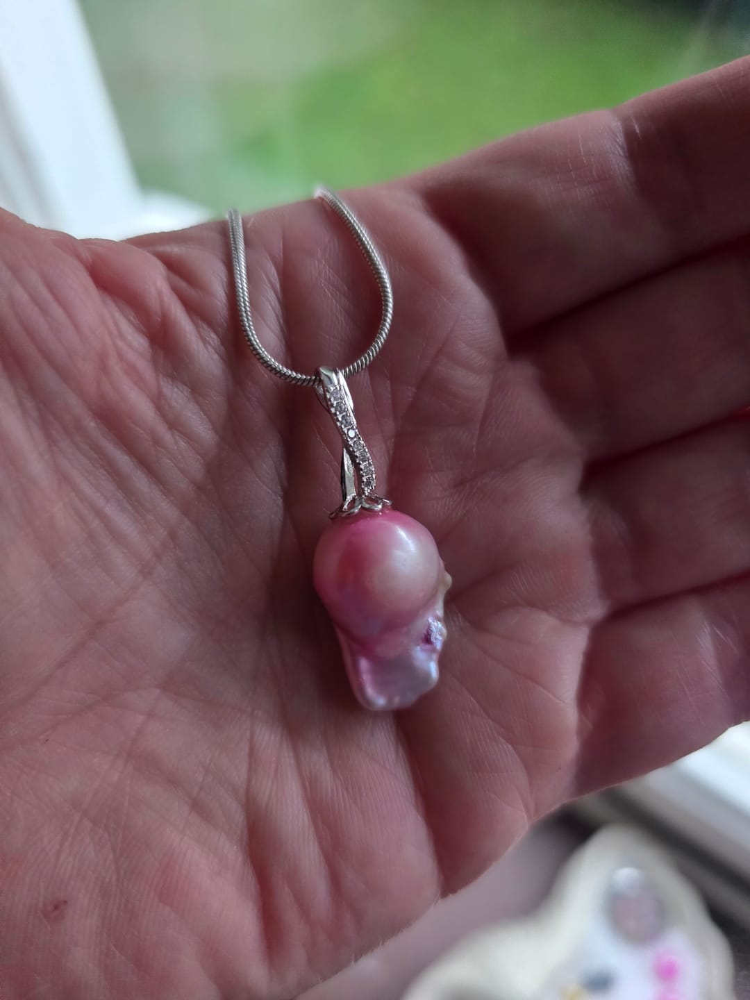 Customer photo review of Akoya Oyster - Fireball Shaped Pearl
