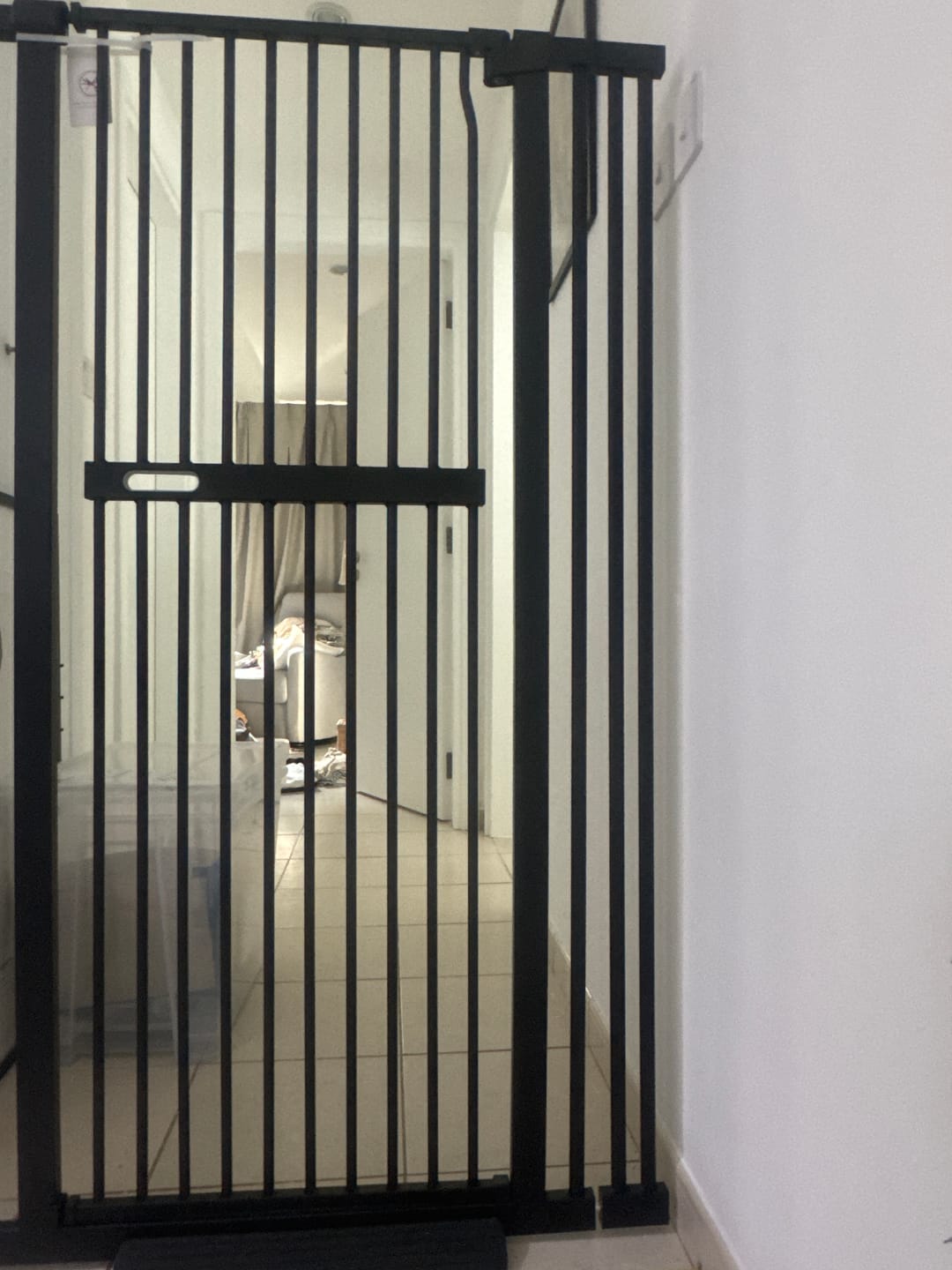 Customer photo review of FairyBaby 55"/61" Extra Tall Cat Gate with Narrow Bar Spacing
