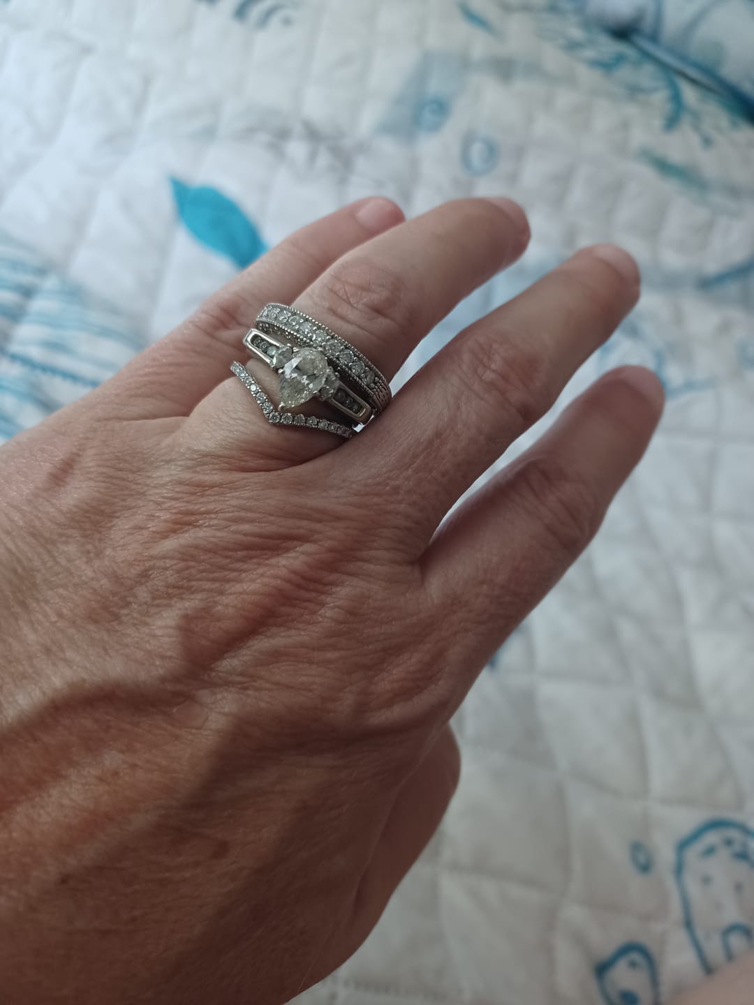 Customer photo review of Vintage Moissanite Sterling Silver Wedding Band Stackable Ring