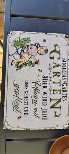 Customer photo review of Personalisiertes Gartenschild aus Aluminium "Ein Garten is ein Himmel mit Sternen aus Blumen"