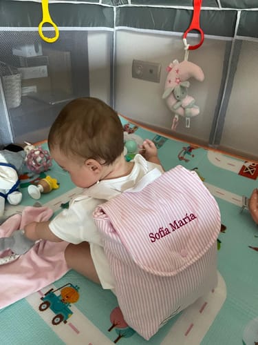 Customer photo review of Mochila infantil rayas rosa