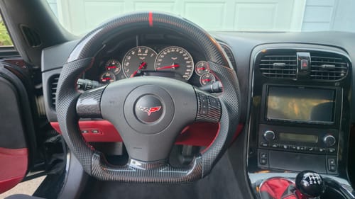 Customer photo review of Genuine Carbon Fiber Steering Wheel With Button Trim For C6 Corvette 2006-2011
