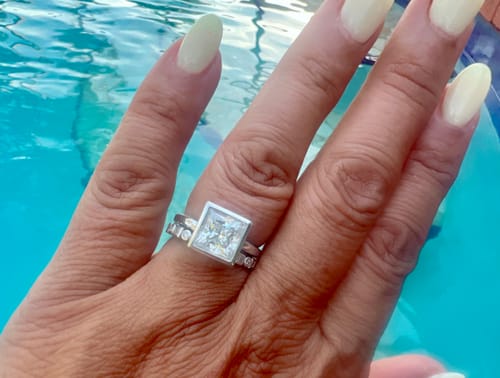 Customer photo review of Solitaire Princess Cut Moissanite Bezel Set Engagement Ring