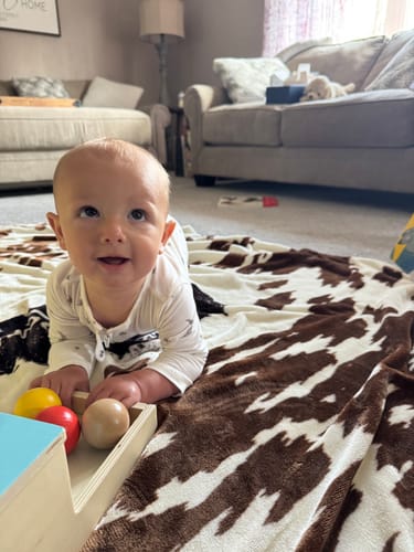 Customer photo review of Curated Monthly Baby Box