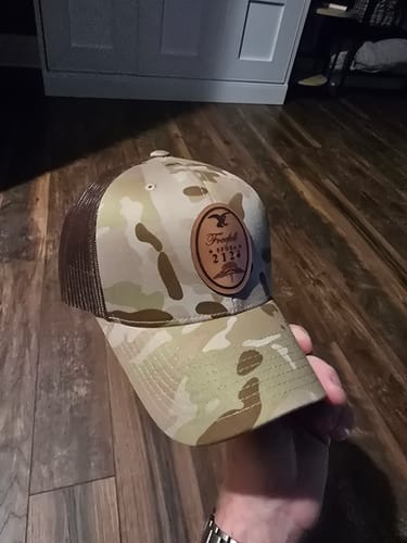 Customer photo review of Custom Leather Patch Trucker Hat - Yupoong 6606