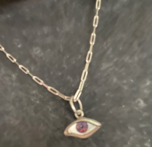 Customer photo review of Green Silver Inlay Small Protective Eye Pendant