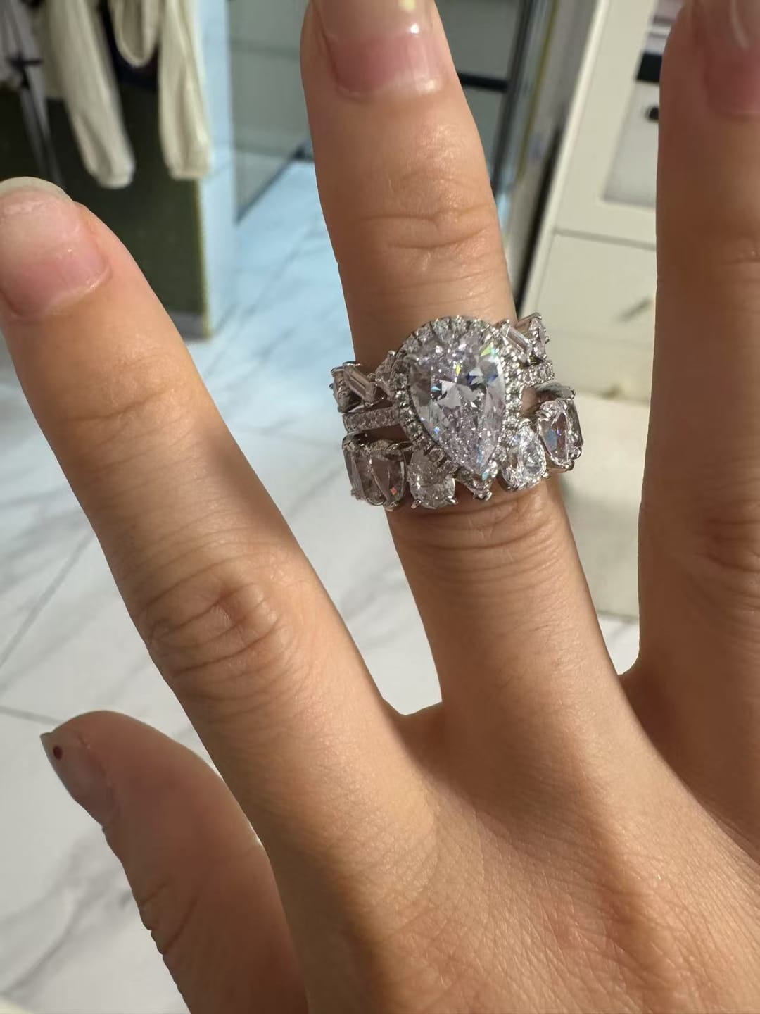 Customer photo review of S925 2.2 Carat Halo Pear Cut Wedding Ring Set With Two Luxurious Wedding Bands For Women