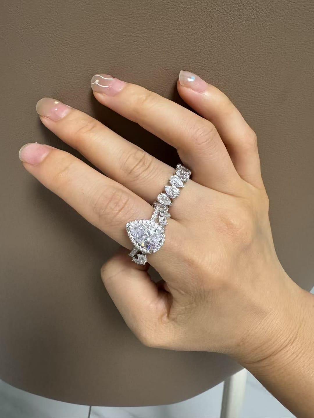 Customer photo review of S925 2.2 Carat Halo Pear Cut Wedding Ring Set With Two Luxurious Wedding Bands For Women