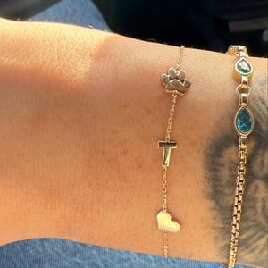 Customer photo review of 14K Solid Gold Paw Print Bracelet