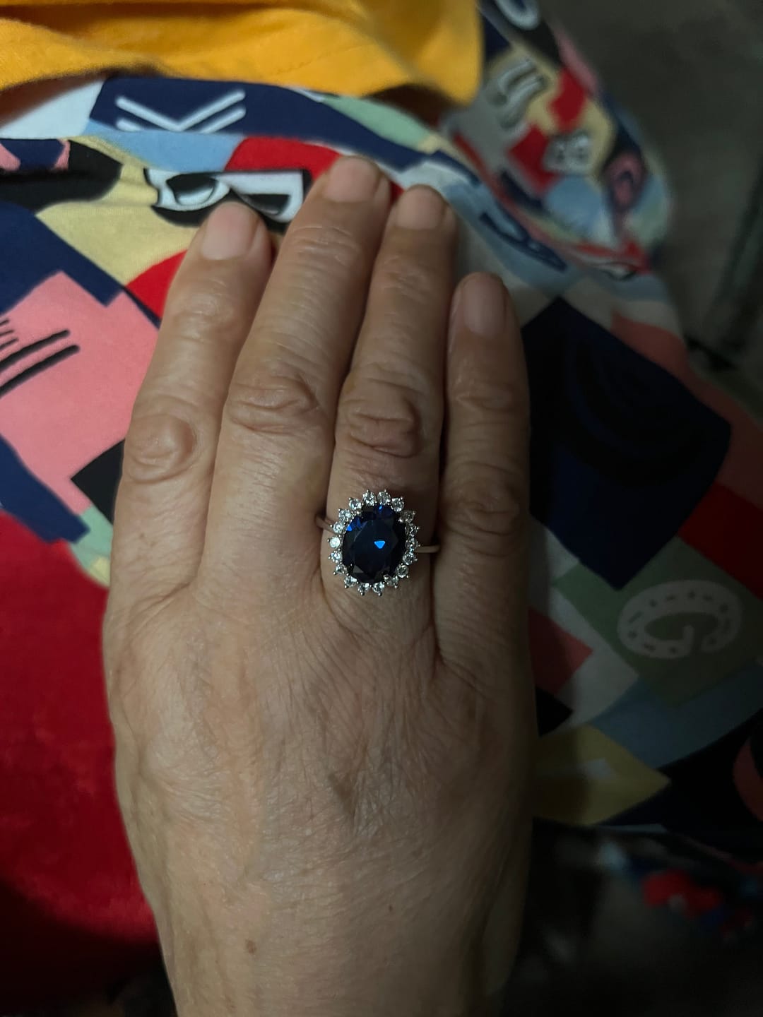 Customer photo review of 4.5 Carat Halo Oval Cut Blue/Red/Green/Yellow Sapphire Engagement Ring In Sterling Silver