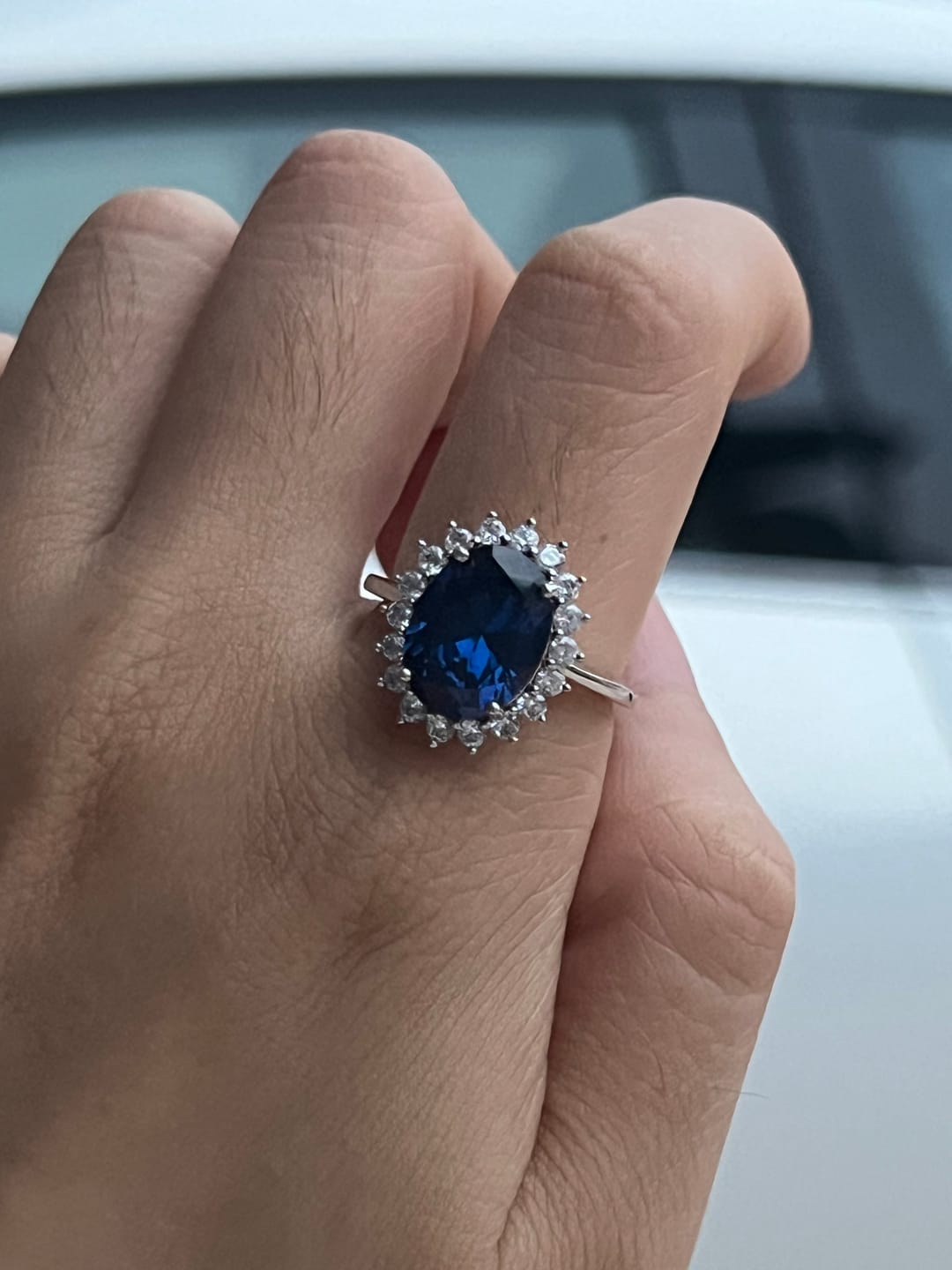 Customer photo review of 4.5 Carat Halo Oval Cut Blue/Red/Green/Yellow Sapphire Engagement Ring In Sterling Silver