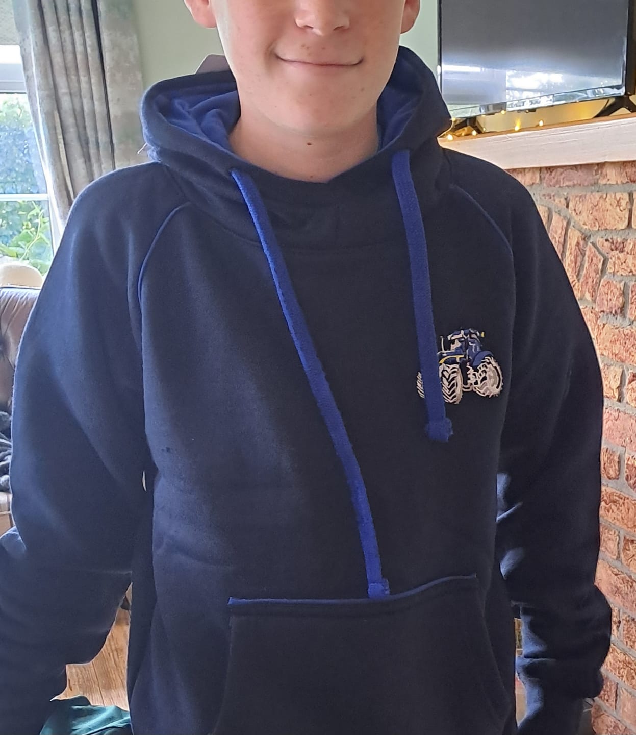 Customer photo review of Kids Blue Tractor Hoodie