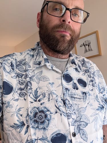 Customer photo review of Men's Skull Floral Print Casual Lapel Button Short Sleeve Shirt