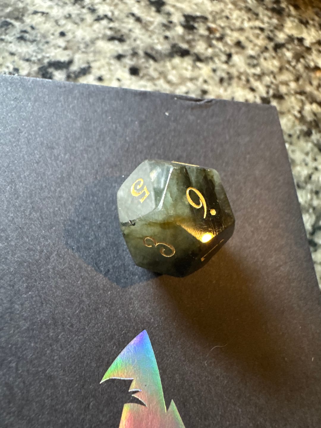 Customer photo review of URWizards D&D Labradorite Gemstone Engraved Dice Set