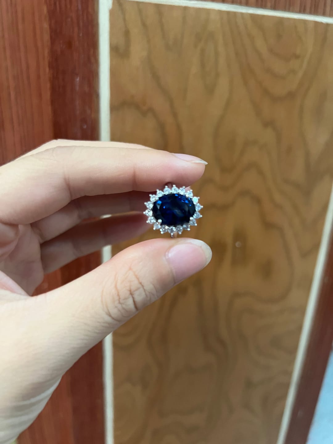Customer photo review of 4.5 Carat Halo Oval Cut Blue/Red/Green/Yellow Sapphire Engagement Ring In Sterling Silver