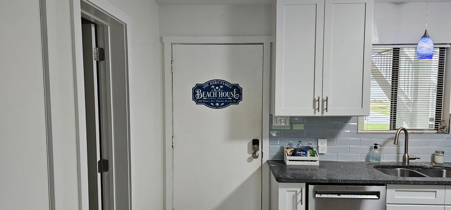 Customer photo review of Beach House Metal Sign