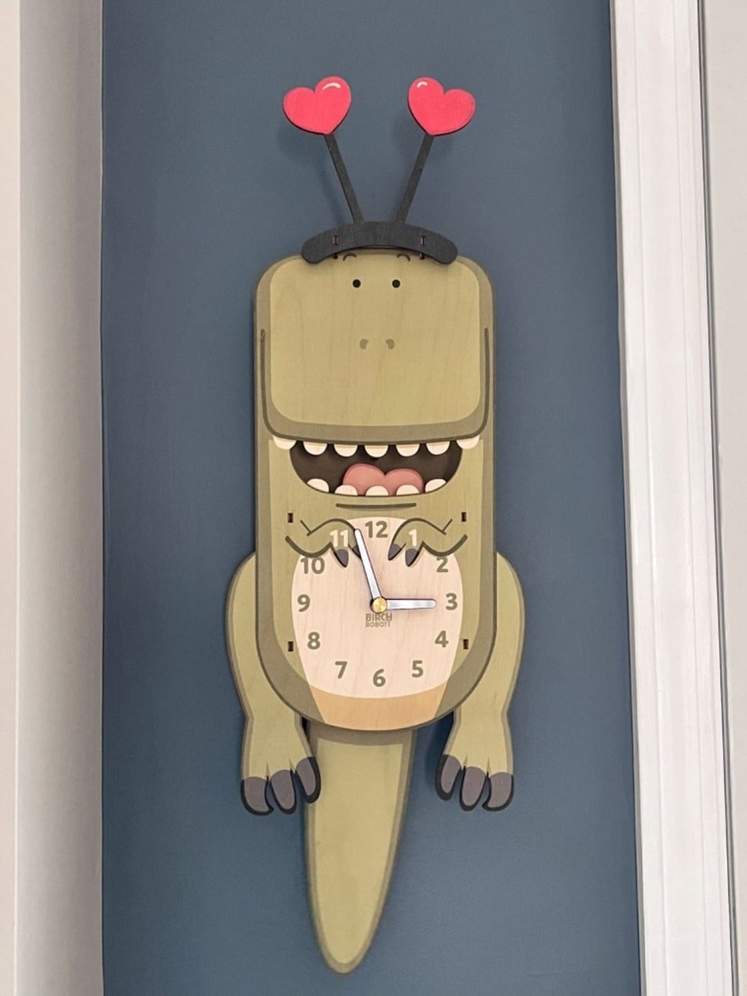 Customer photo review of Ralphie the T-Rex Pendulum Clock