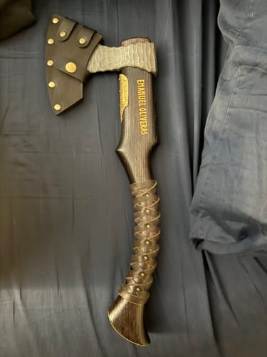 Customer photo review of Hand Forged Viking Axe "Veles" with leather wrap on the handle
