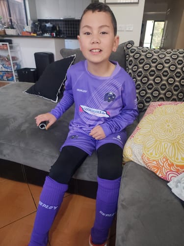 Customer photo review of Deploy Performance Football Socks - Purple